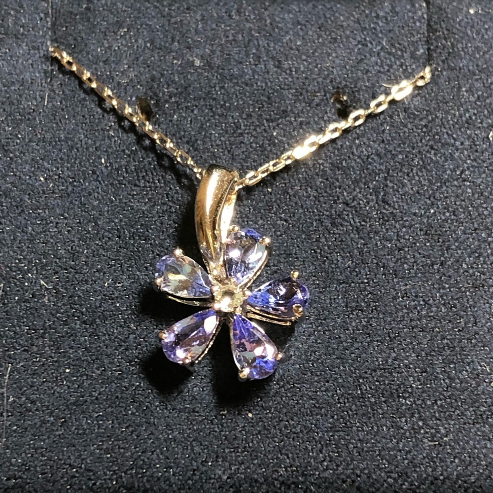 Tanzanite and diamond flower pendant necklace